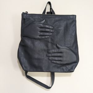 Leather hand backpack